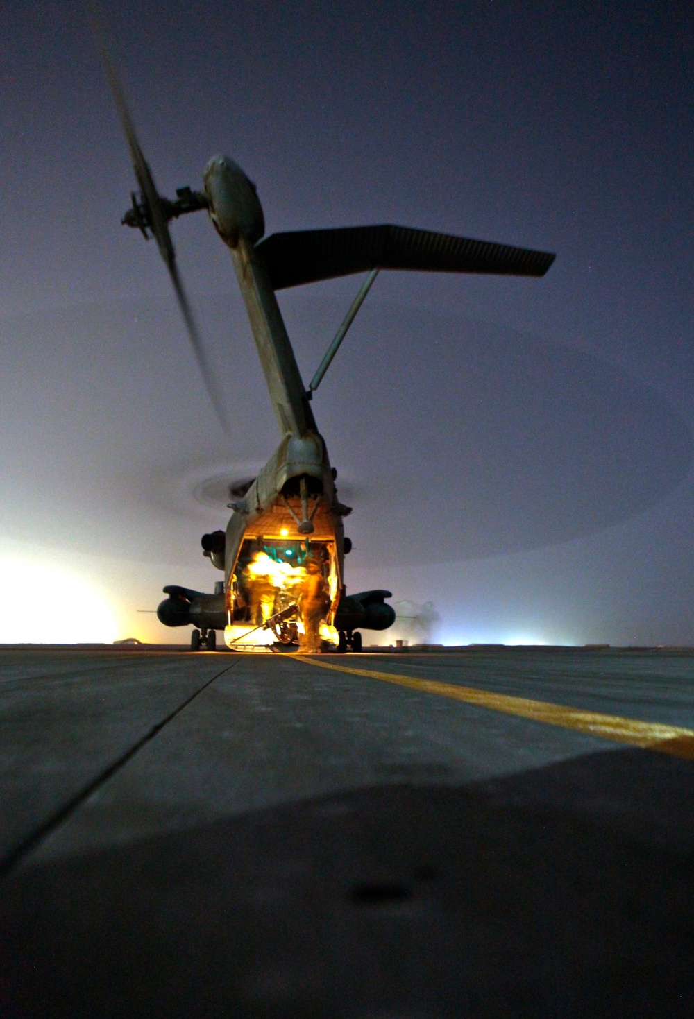U.K. soldiers board U.S. helos for combined operations in Afghanistan.