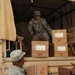 Guardsmen help first lady of Louisiana deliver school supplies