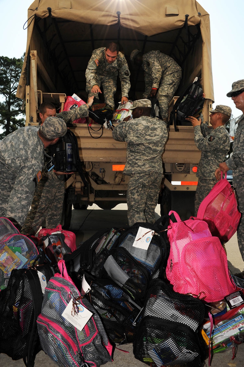 Guardsmen help first lady of Louisiana deliver school supplies