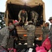 Guardsmen help first lady of Louisiana deliver school supplies