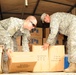 Guardsmen help first lady of Louisiana deliver school supplies