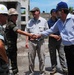 Ambassador Paul A. Trivelli, Deputy to the Commander and Foreign Policy Advisor, U.S. Southern Command, Visits With Task Force Kout Men New Horizons-Haiti 2010 Seabees During a Visit to the Diaqoui School Engineering Sites in Gonaives, Haiti Aug 4