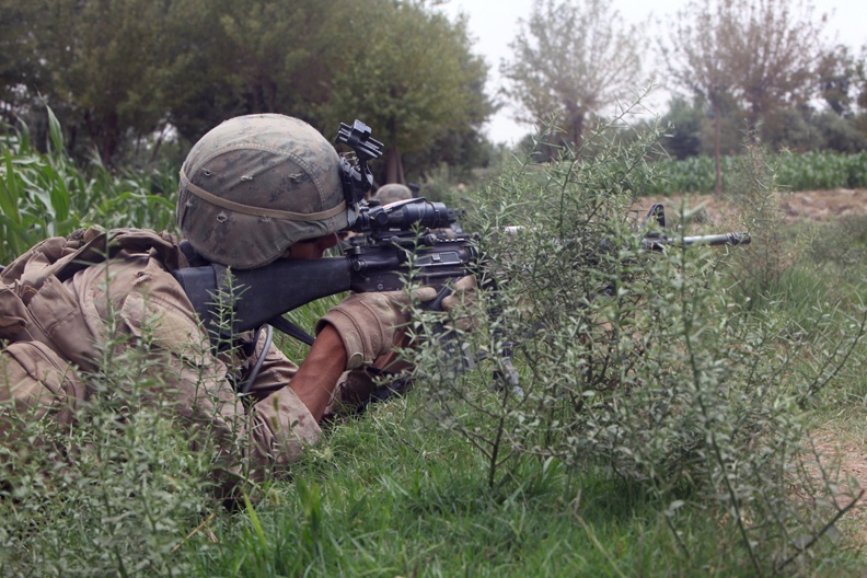 Marines battle Taliban, protect locals