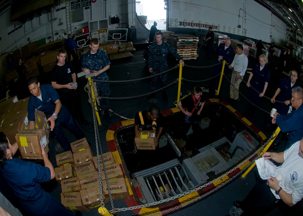 USS George Washington takes on supplies