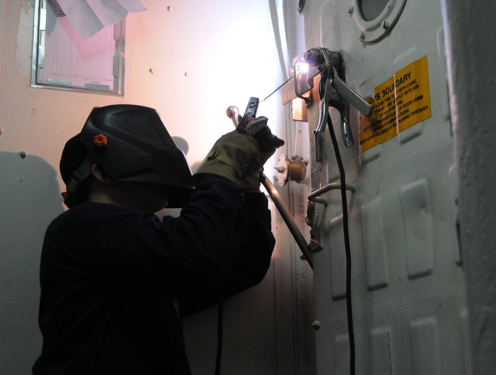 USS Wasp sailors conduct repairs