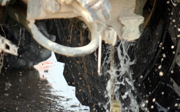 Seeking Sand, Birds, Ammo: Arifjan Wash Rack, Customs Ready Armored Vehicles for Redeployment