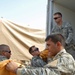 In preparation for the fast: IA soldiers feed 200 needy families in Tarmiyah