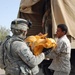 In preparation for the fast: IA soldiers feed 200 needy families in Tarmiyah
