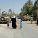 In preparation for the fast: IA soldiers feed 200 needy families in Tarmiyah