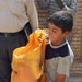 In preparation for the fast: IA soldiers feed 200 needy families in Tarmiyah