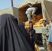 In preparation for the fast: IA soldiers feed 200 needy families in Tarmiyah