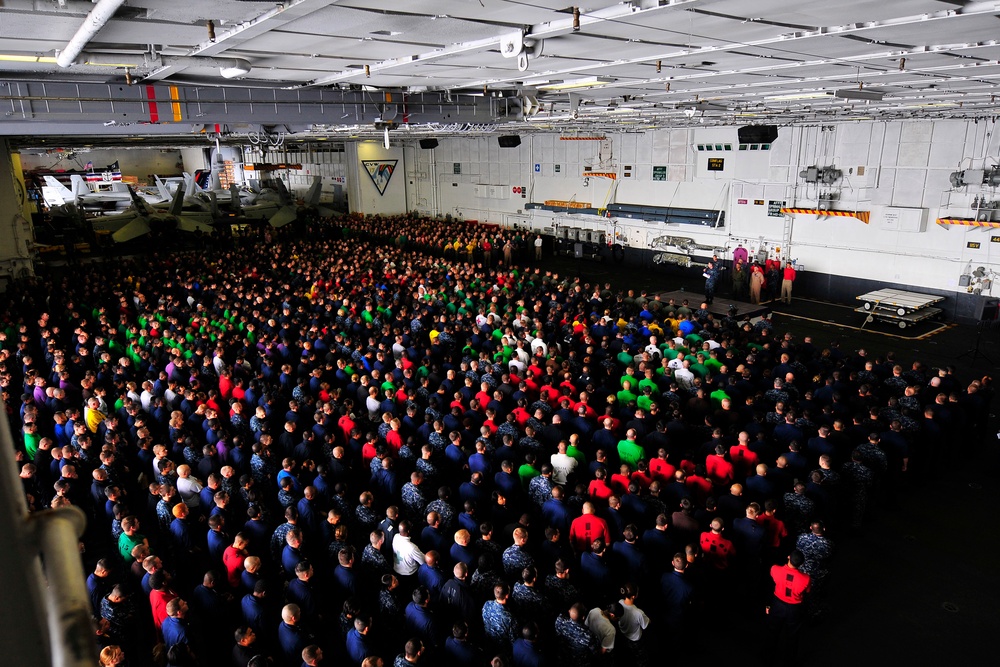 Commander speaks to sailors