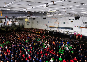Commander speaks to sailors