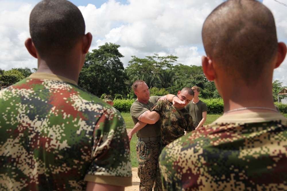 Marines enhance foreign partnerships with Colombia during non-lethal weapons tactics