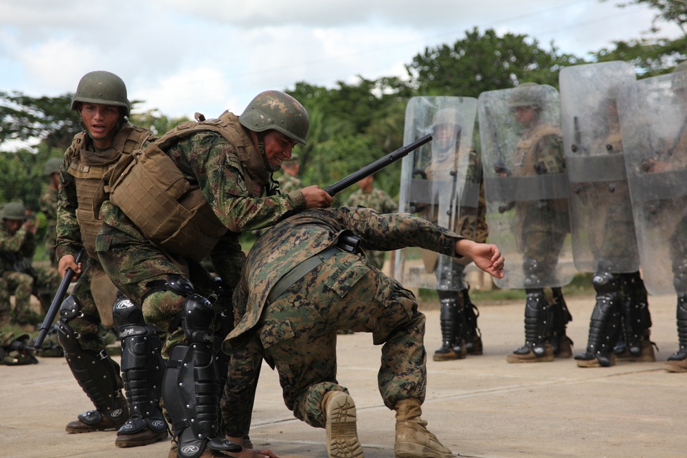 Marines enhance foreign partnerships with Colombia during non-lethal weapons tactics