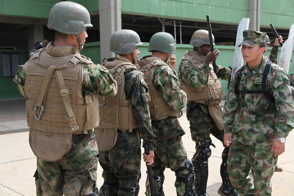 Marines enhance foreign partnerships with Colombia during non-lethal weapons tactics