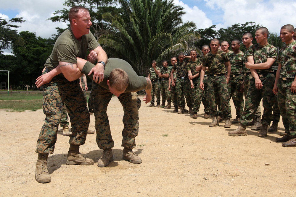 Marines enhance foreign partnerships with Colombia during non-lethal weapons tactics