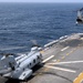 Helicopters leave USS Peleliu