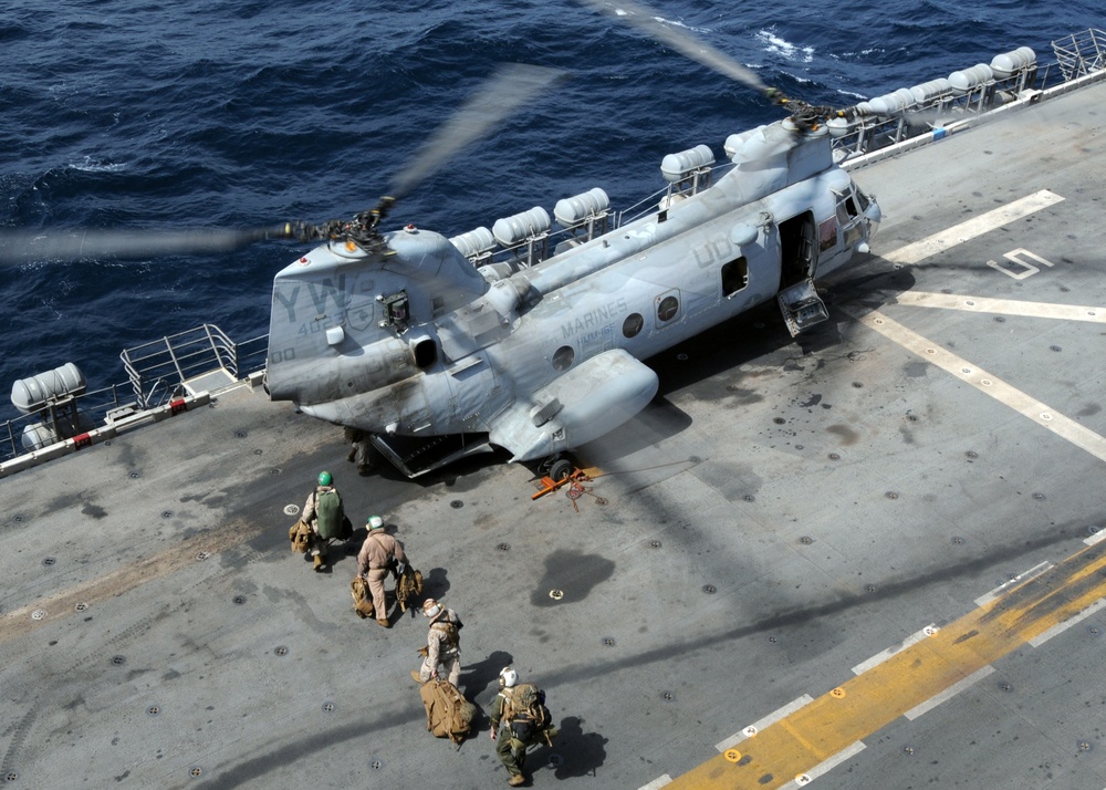 Helicopters leave USS Peleliu