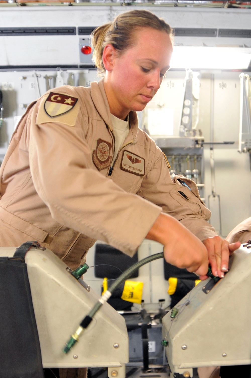 Airmen Turn Cargo Plane Into Passenger Plane