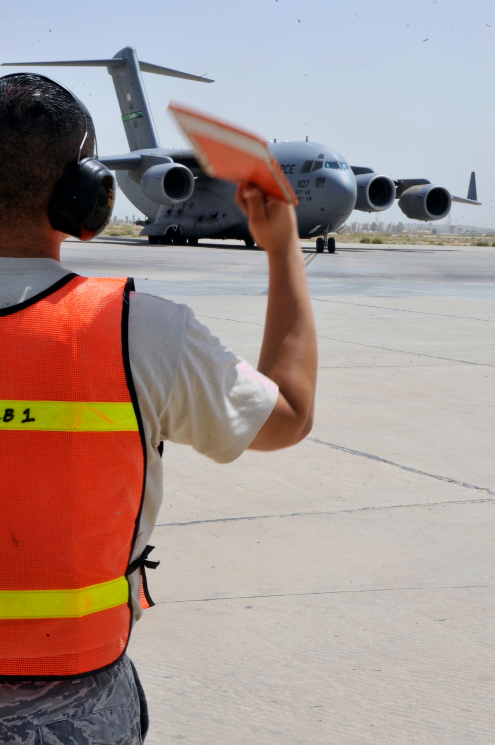 Airmen Turn Cargo Plane Into Passenger Plane