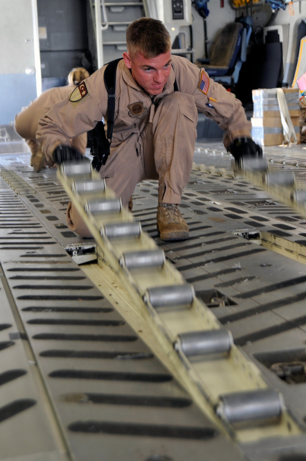 Airmen Turn Cargo Plane Into Passenger Plane