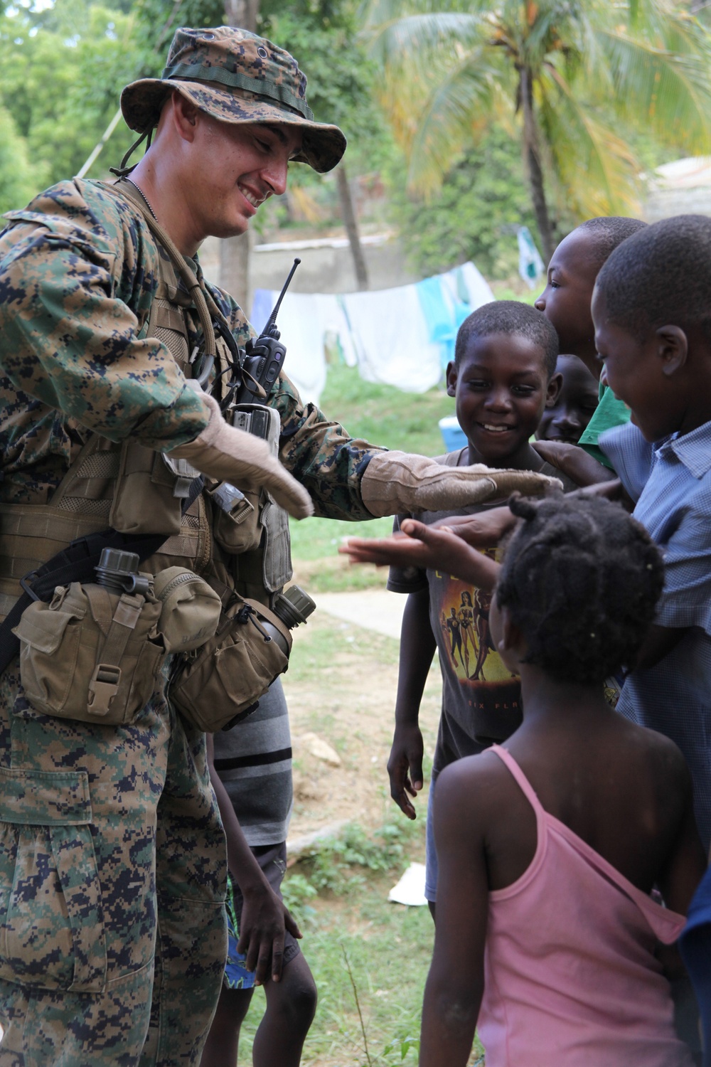 Marines, sailors sweat off a good deed during construction work in Haiti