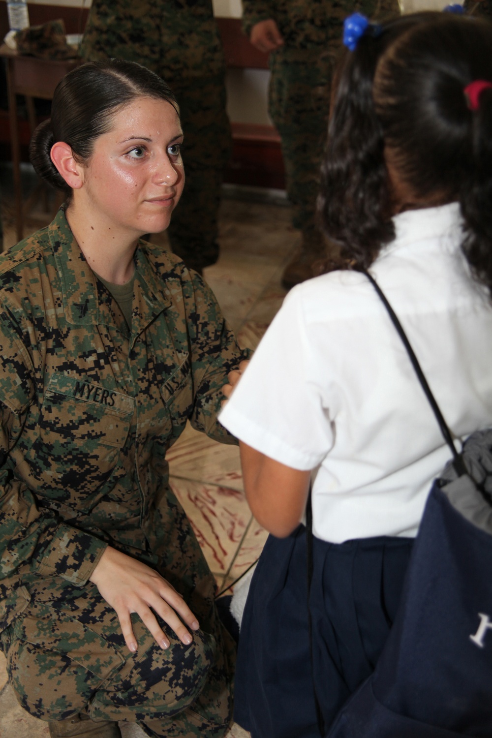Marines working with NGO Give a Kid a Backpack