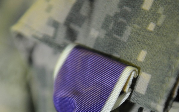 USD-C Soldier receives Purple Heart from US defense secretary