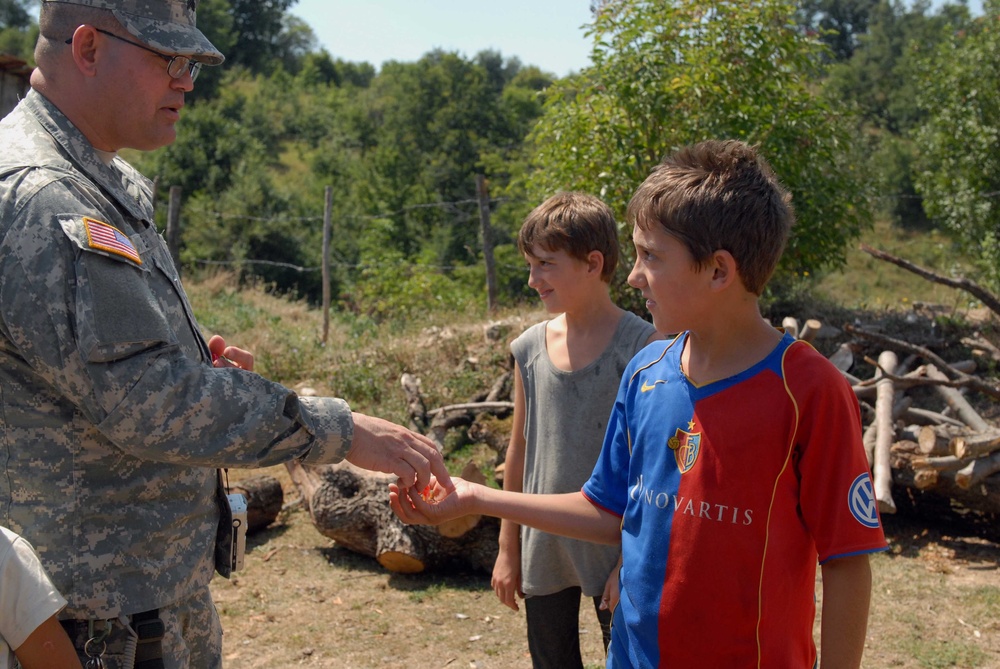 Soldiers Work With People in Kosovo, Get Sense of Reality