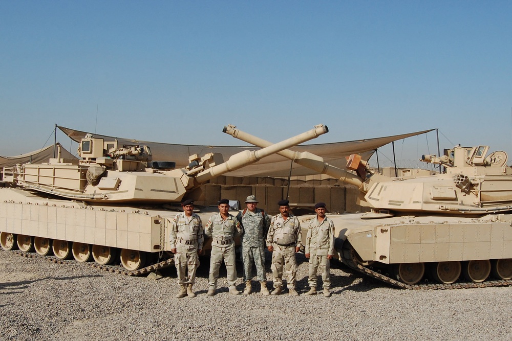 'The Faces of Collaboration': Platoon of IA Soldiers Graduates From M1A1 Pre-NET