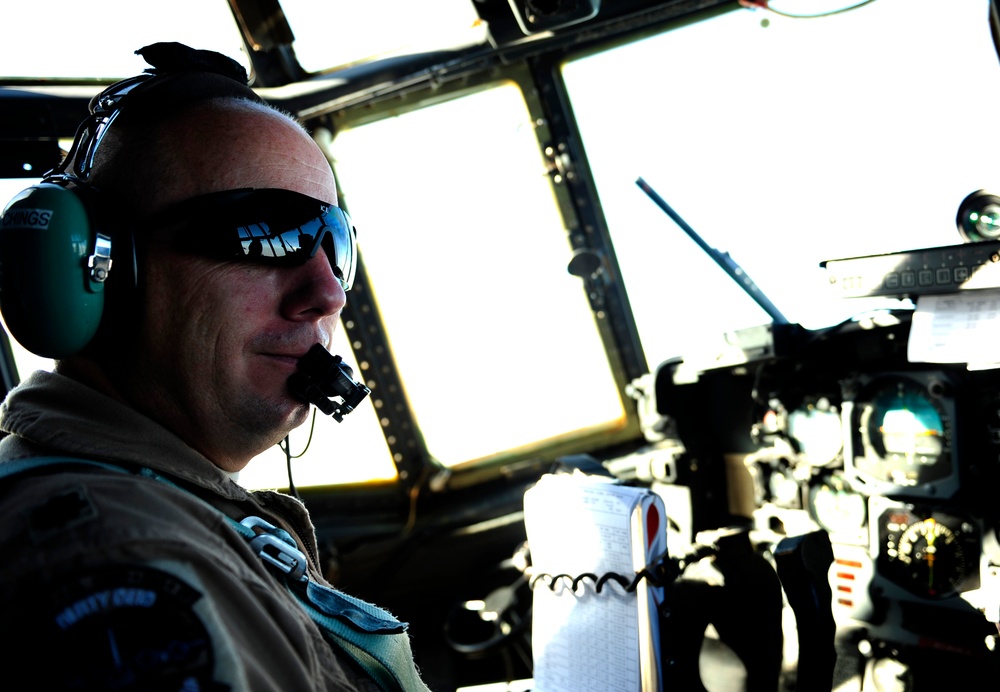 Reserve Lieutenant Colonel Pilots C-130 for Combat, Humanitarian Airlift Missions