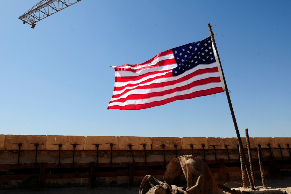 Service members fly flags over palace for 9/11 remembrance