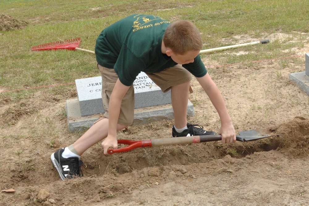 Boy Scouts Volunteer to Landscape at the 3rd Special Forces Group Memorial Walk on the Anniversary of 9/11