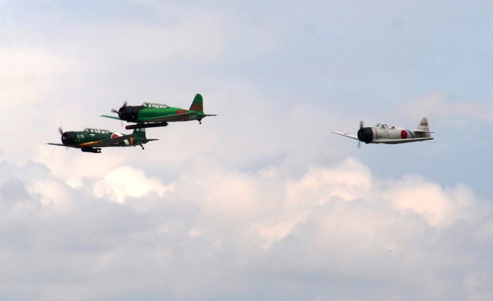 World War II-era Aircraft Re-enact Pearl Harbor Attack During Scott AFB Airshow