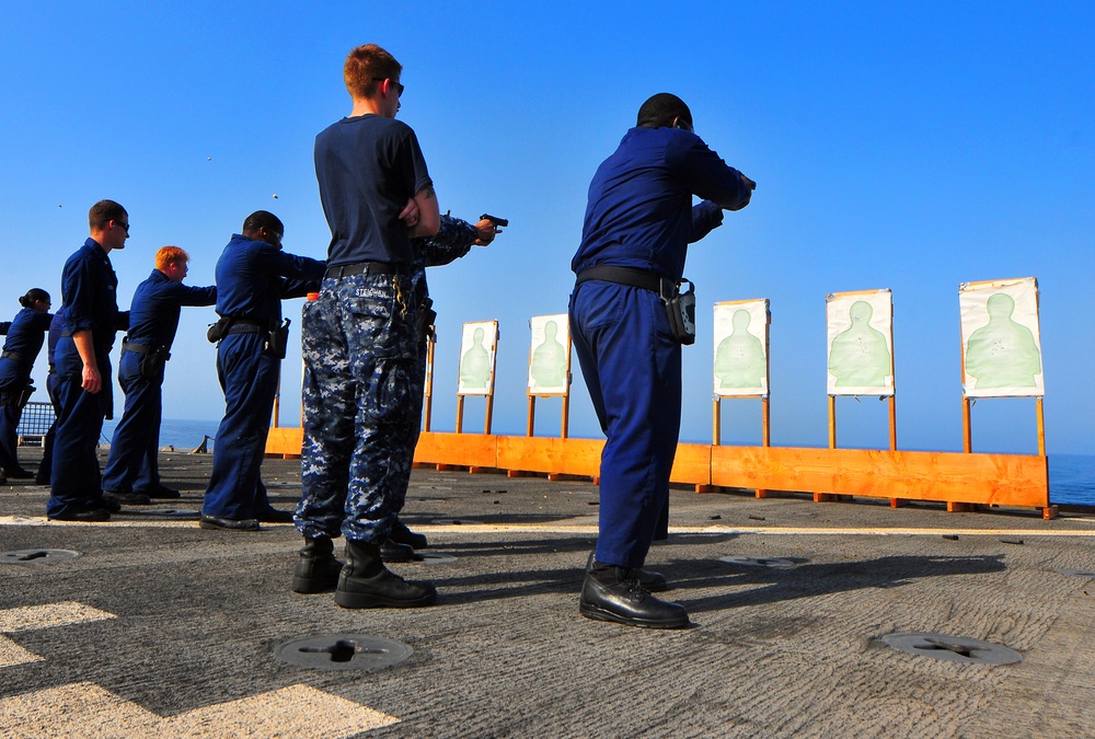 USS Pearl Harbor crew train with handguns