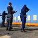 USS Pearl Harbor crew train with handguns