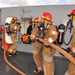 Navy firefighters train