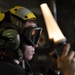 Sailor guides landing craft
