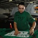 Sailor stencils flight deck