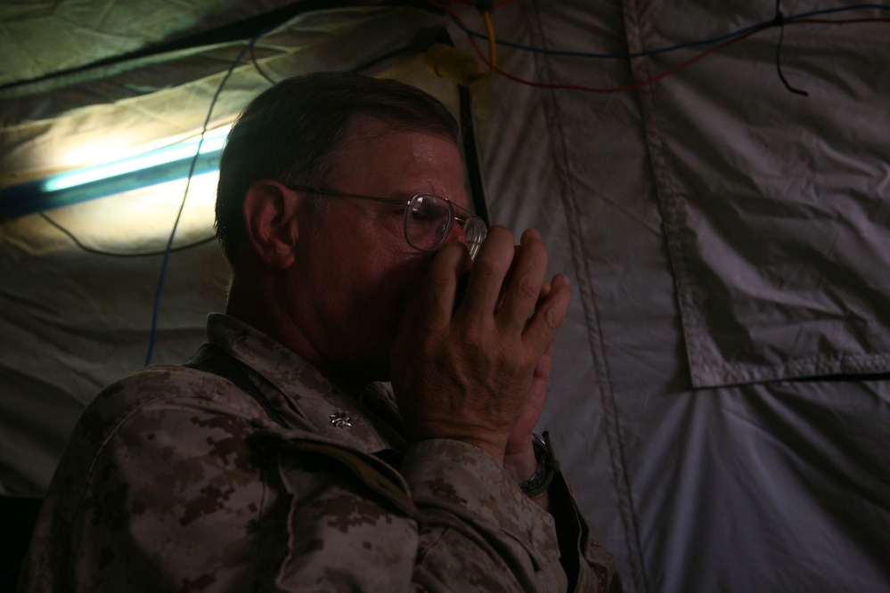 RCT-7 surgeon plays harmonica to pass time in Afghanistan