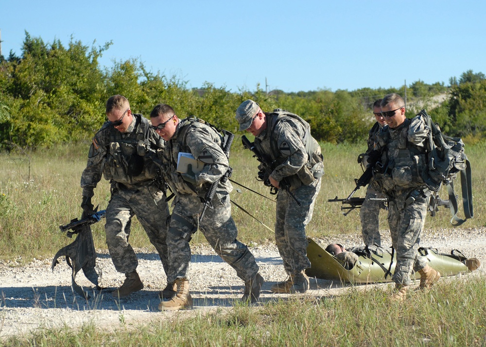 1st Air Cav soldiers run and gun