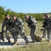 1st Air Cav soldiers run and gun