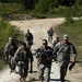 1st Air Cav soldiers run and gun