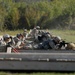 1st Air Cav soldiers run and gun