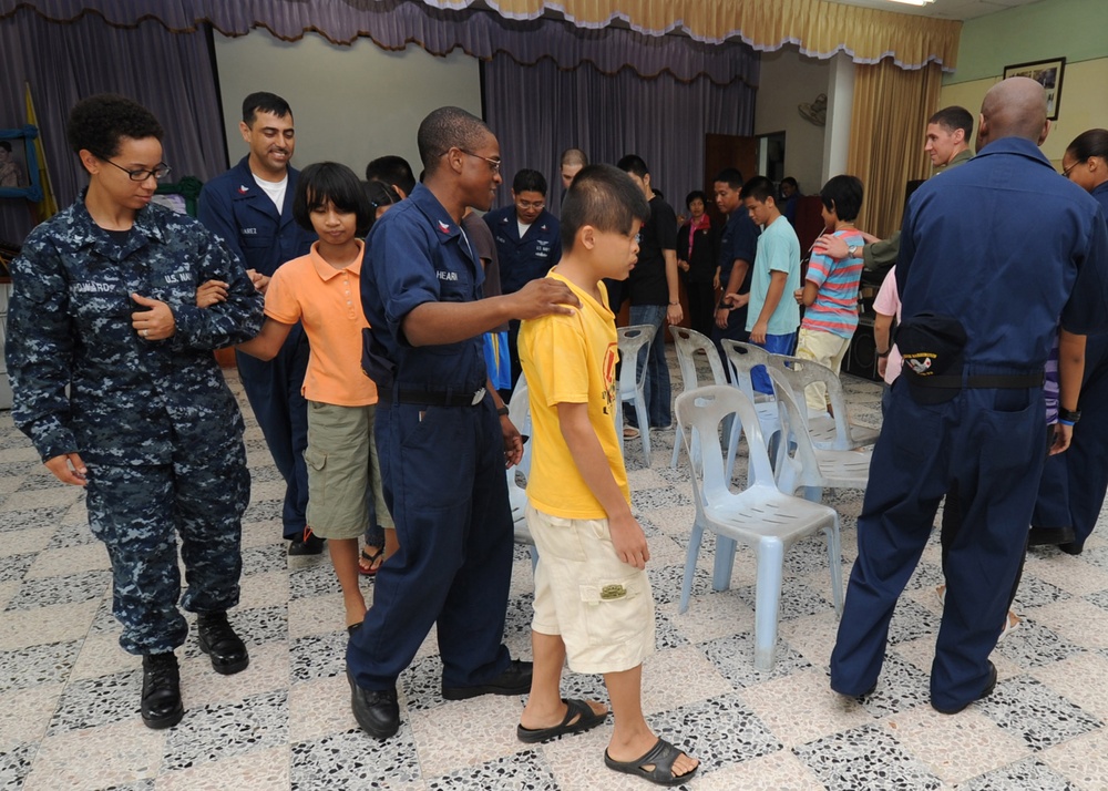 Sailors Help Blind Children