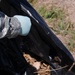 Soldiers pick up litter