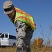 Soldiers pick up litter