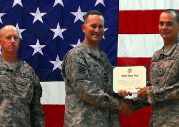 Sixty-three ‘Battle Boar’ Soldiers participate in regiment’s largest reenlistment ceremony