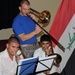 Soldiers, Iraqi Students Hit High Notes With Musical Partnership